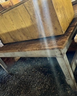 work bench with a crate on top of it
