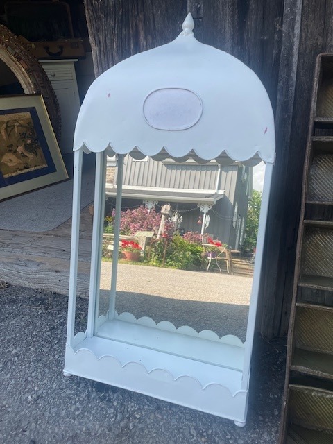 Mirror inside wooden frame