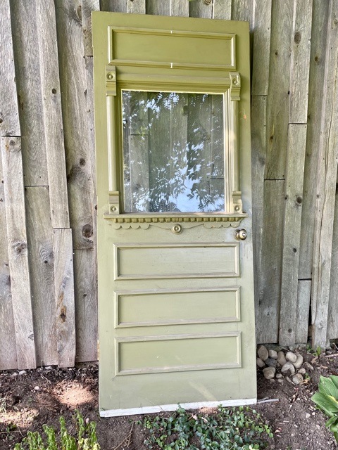 wooden door with glass