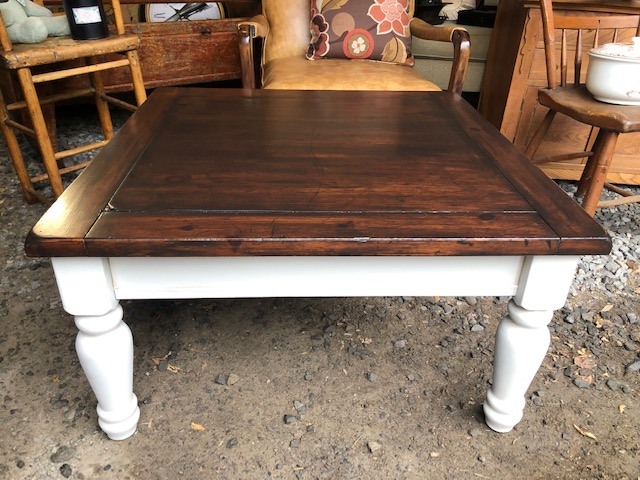 square wooden coffee table with legs painted white