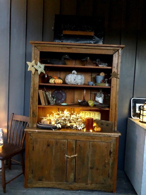 wooden cabinet with ornaments