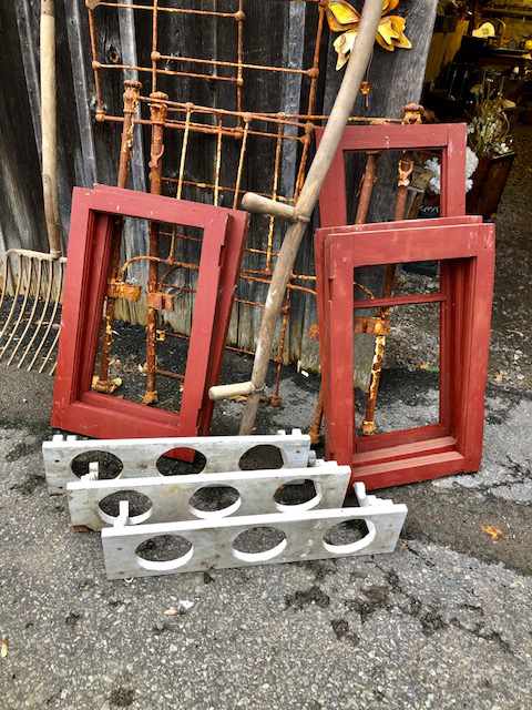 wooden window frames behind wooden potplant holders