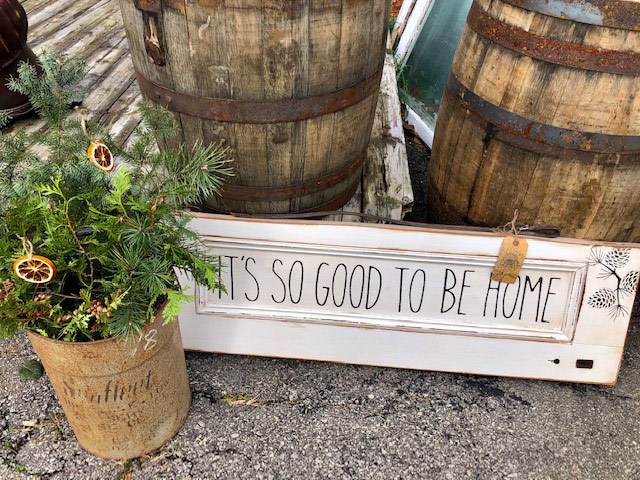 "it's good to be home" sign