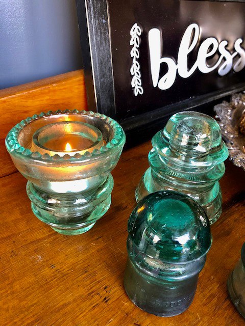 three glass candle holders