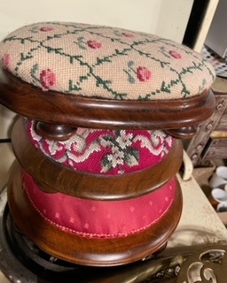 3 footstools resting on each other
